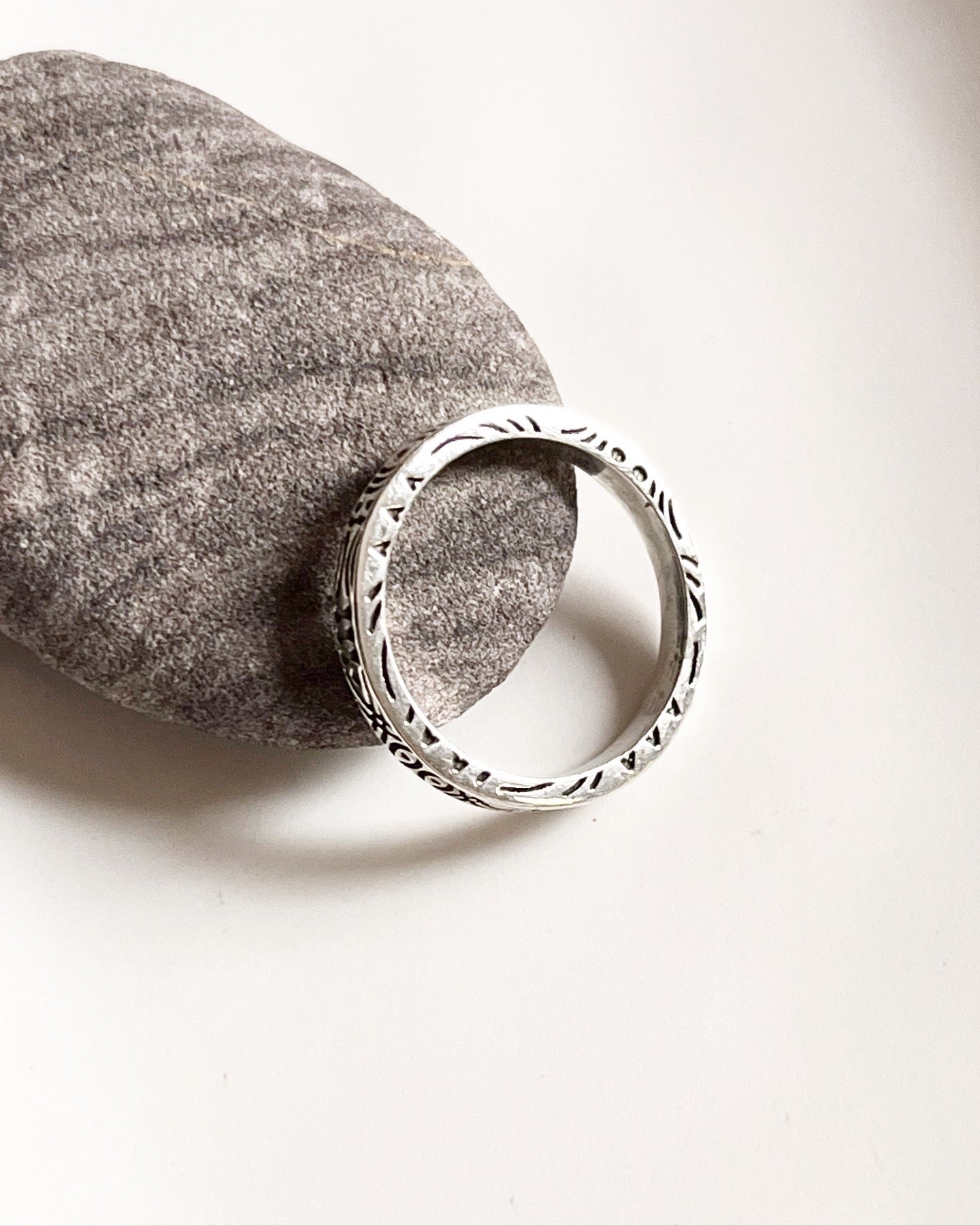 Boho-inspired tribal engraved side band ring in sterling silver