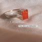 Elegant silver ring featuring a rectangular carnelian stone