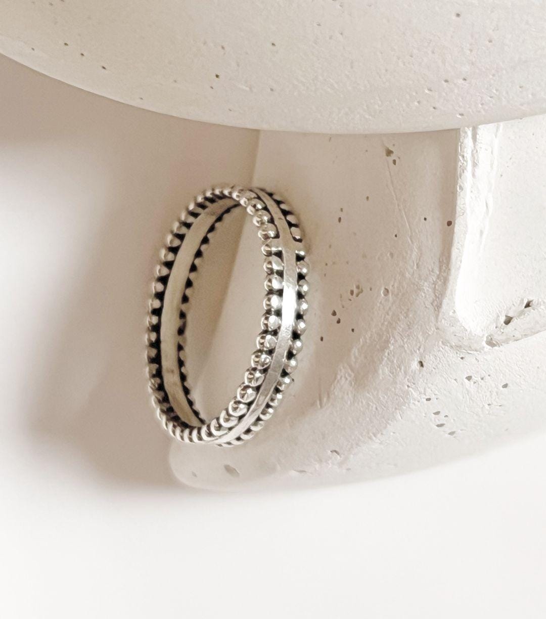 Versatile double rawa silver band ring for everyday elegance