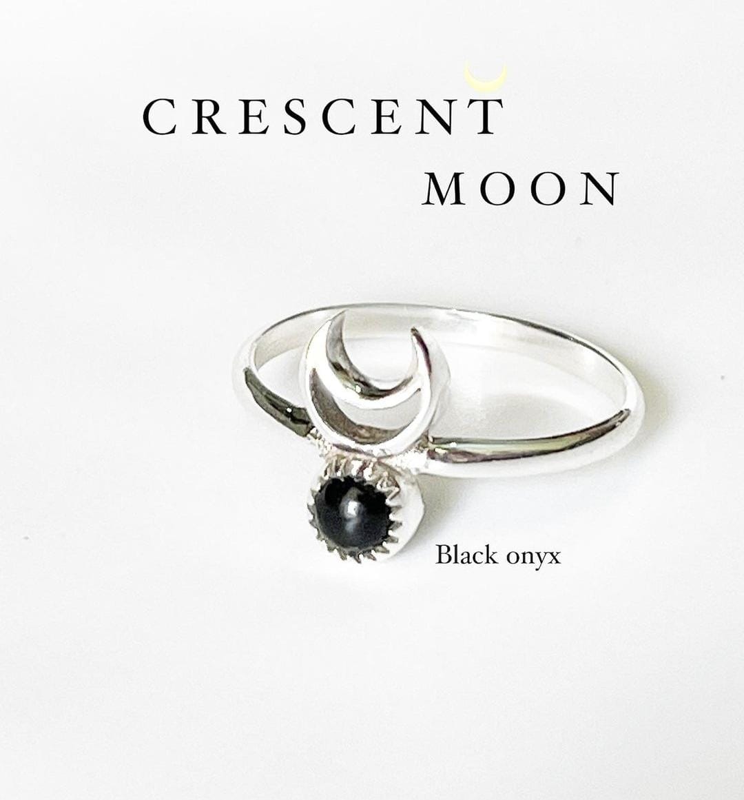 Unique black onyx crescent moon ring in sterling silver for a mystical touch.