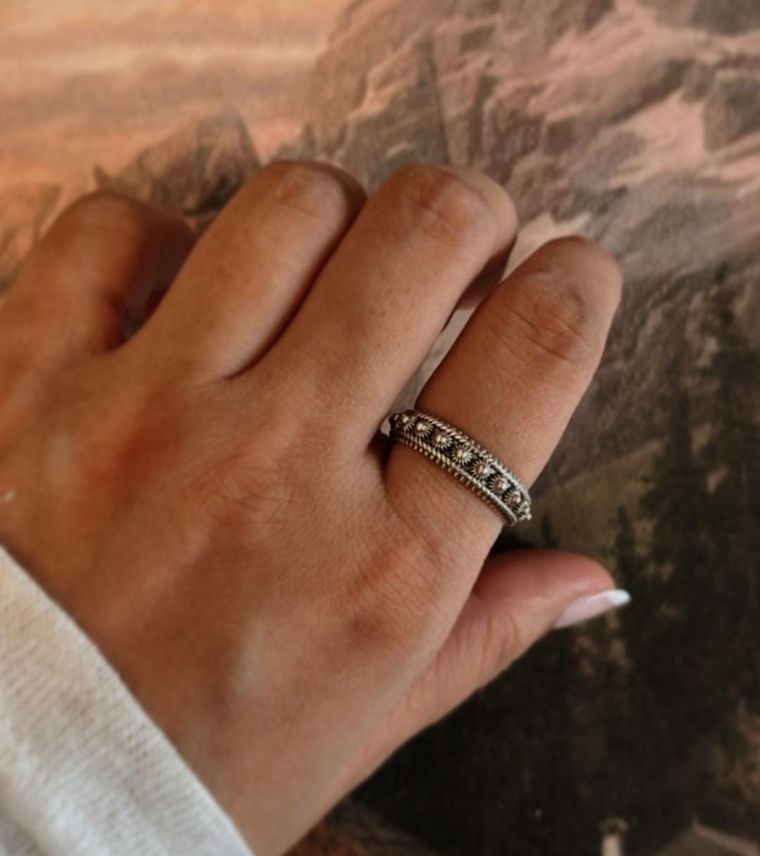 Bohemian Balinese fixed size silver ring with elegant craftsmanship.