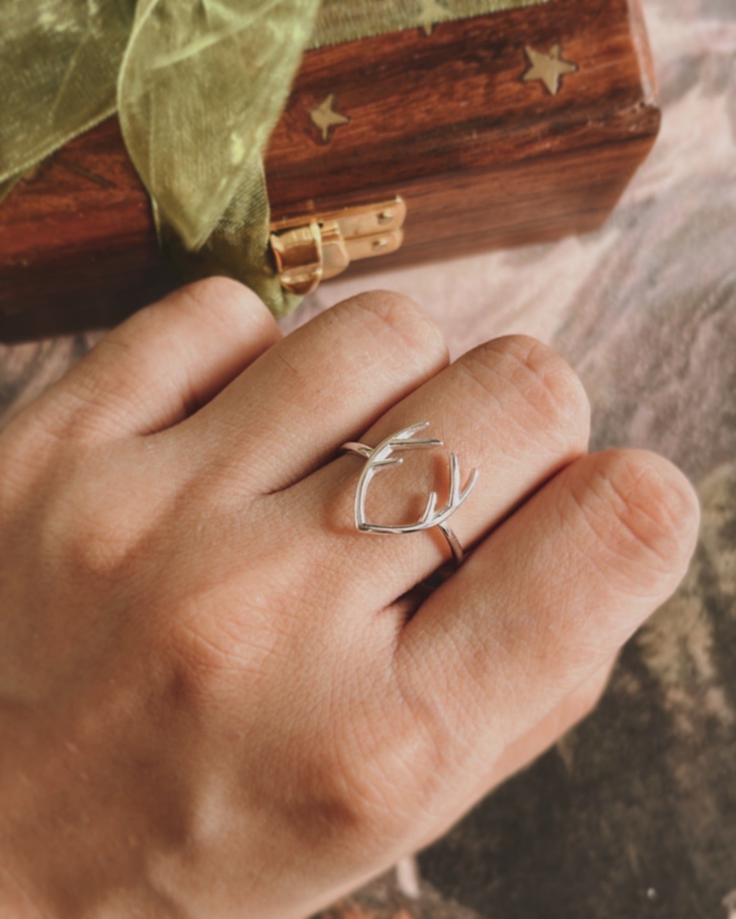 Organic and sophisticated antler silver ring with fine craftsmanship.