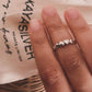 Modern heart-shaped band ring in sterling silver