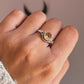 Boho-inspired silver ring featuring a round citrine gemstone