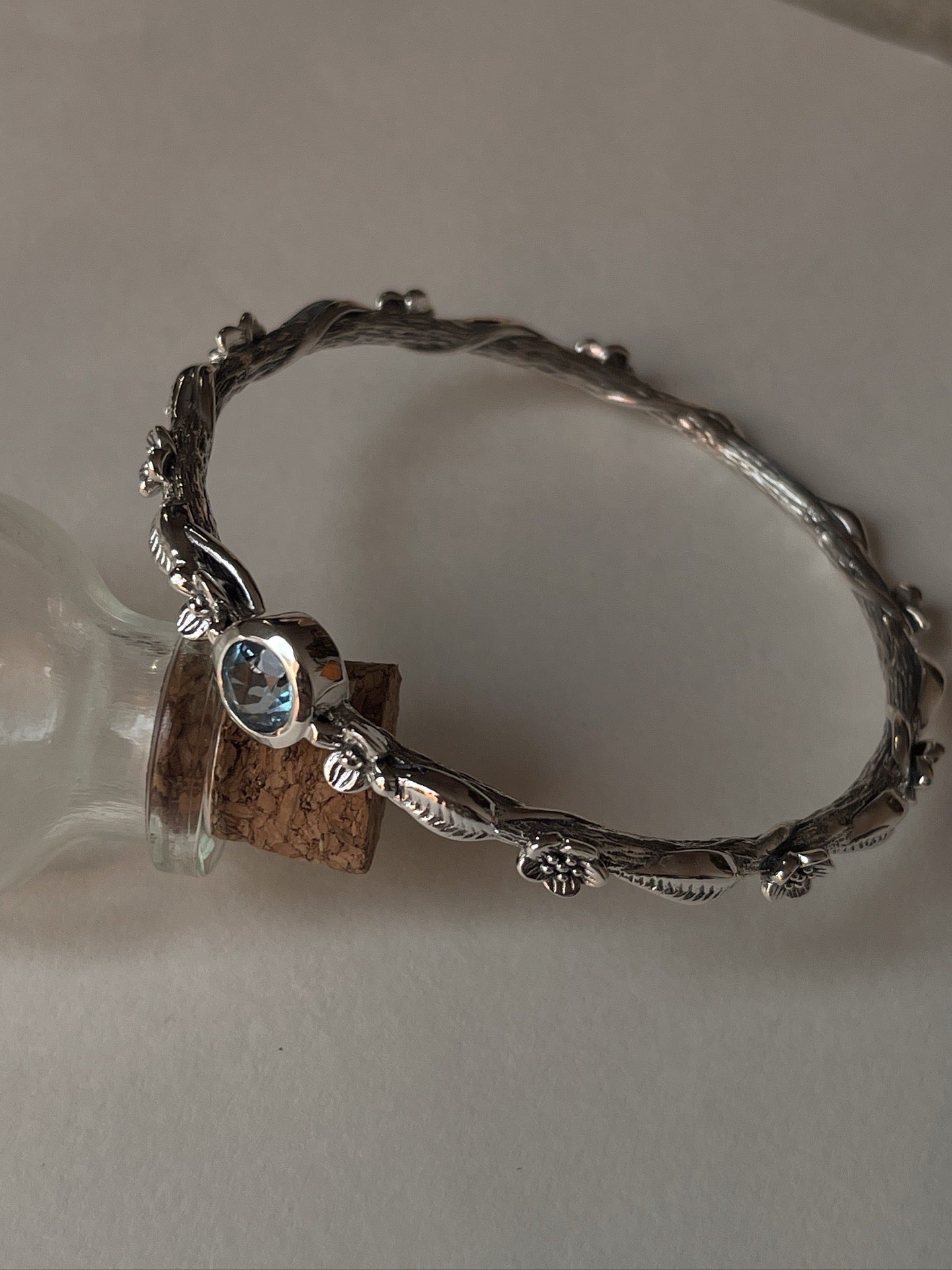 Luxury blue topaz forest enchantment bangle in 925 silver