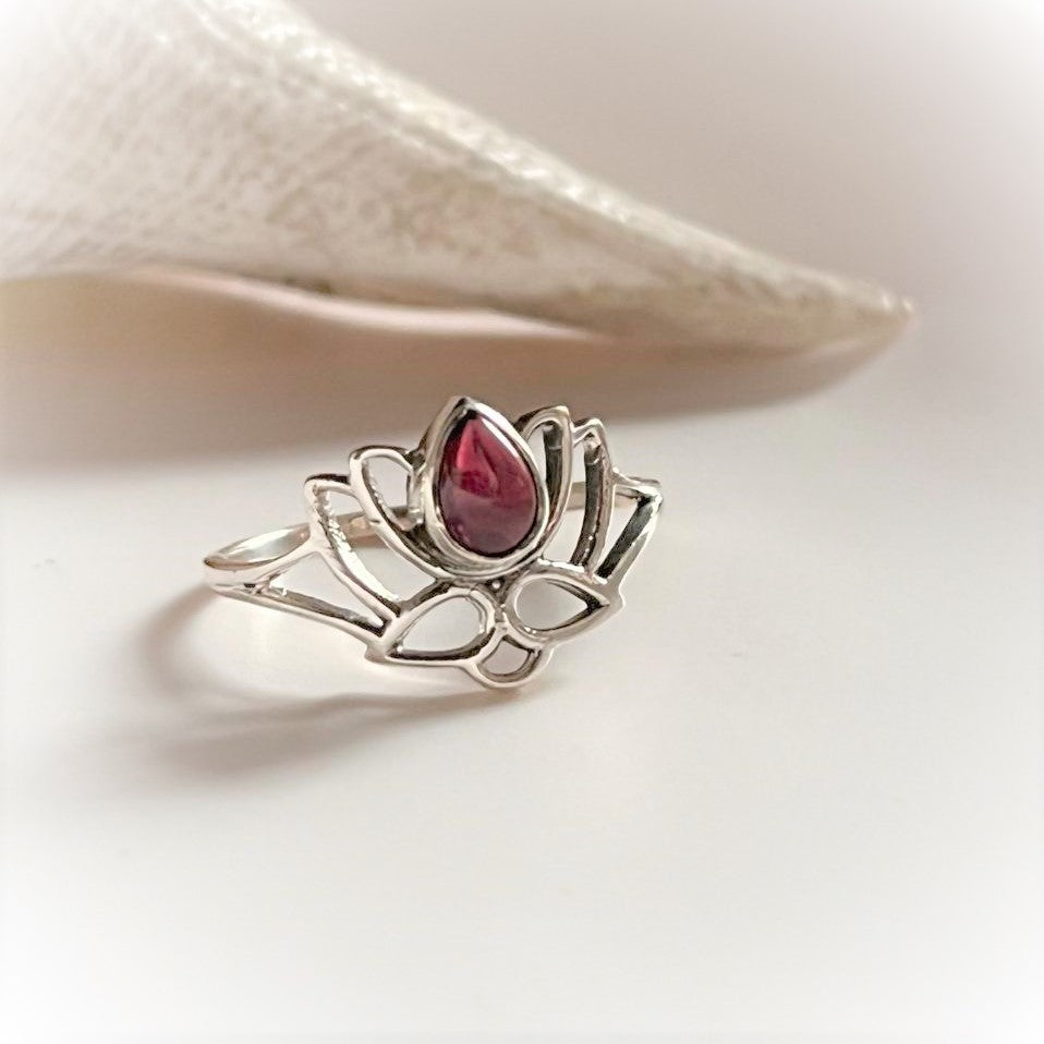 Garnet divine lotus silver ring with a unique flower motif