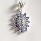 Bold tanzanite statement flower pendant in silver