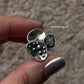 Close-up of Divine Lotus moonstone silver ring with intricate detailing