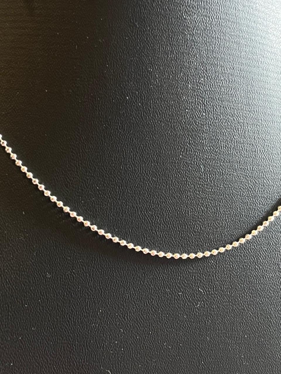 Sophisticated sterling silver chain with dot ball elements