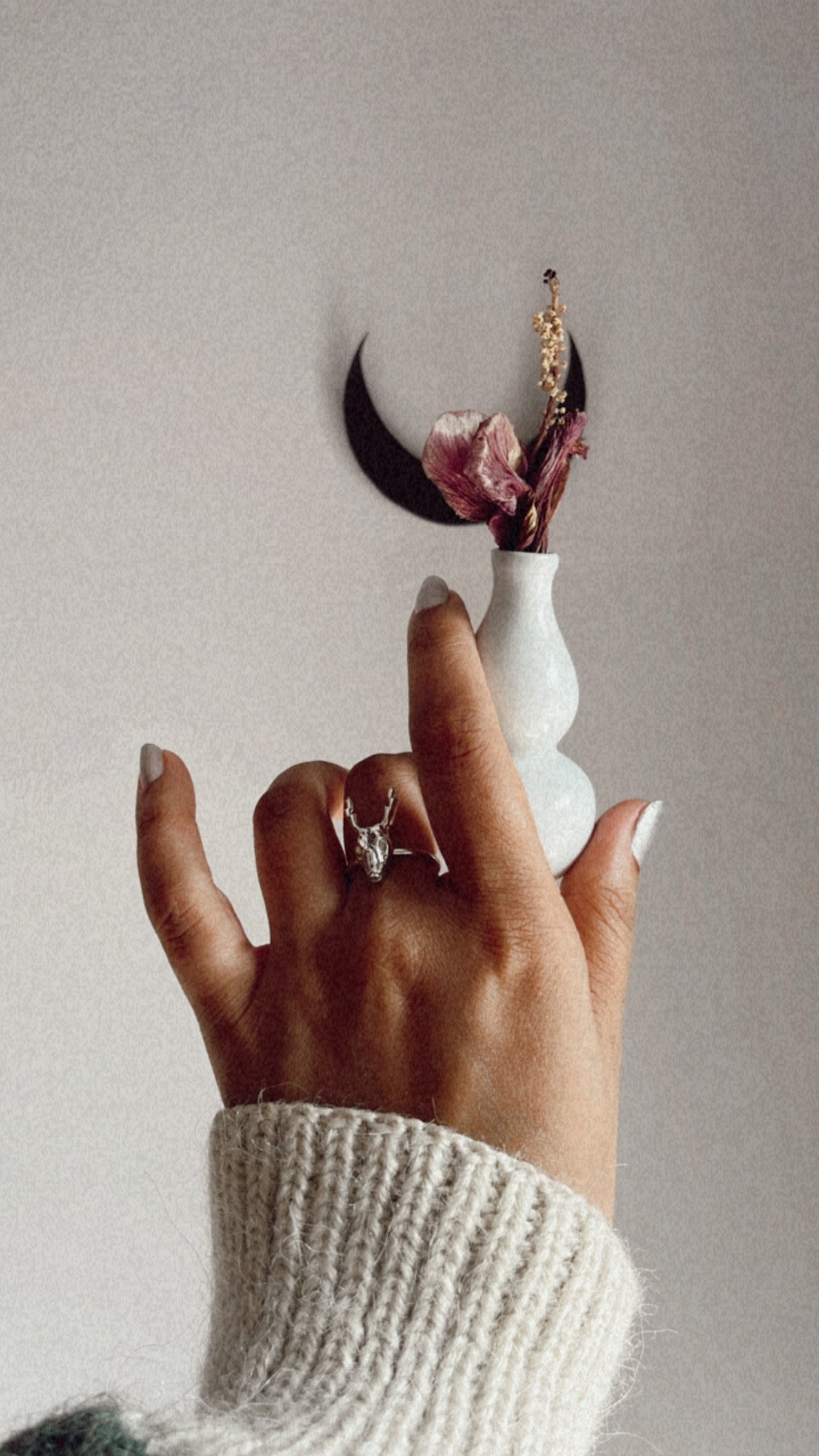 Unique silver ring featuring a detailed deer skull design