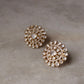 925 Sterling Silver Gold Plated Antique Moissanite Polki Round Studs Earrings on marble surface.