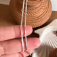 Handcrafted flat snake silver chain with a subtle shine and smooth texture