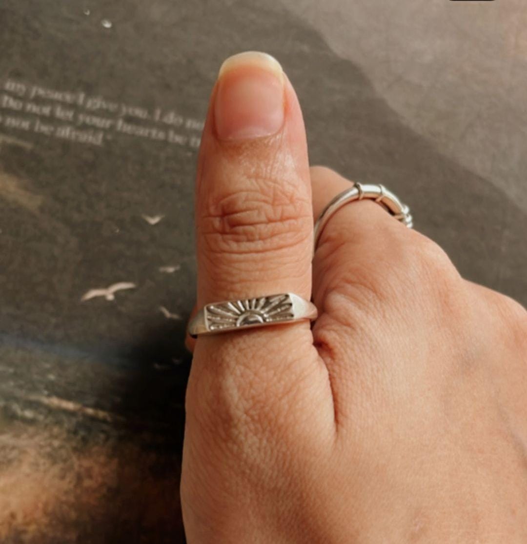 Handcrafted sun engraved signet ring in silver