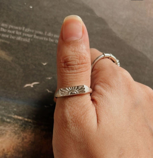 Handcrafted sun engraved signet ring in silver