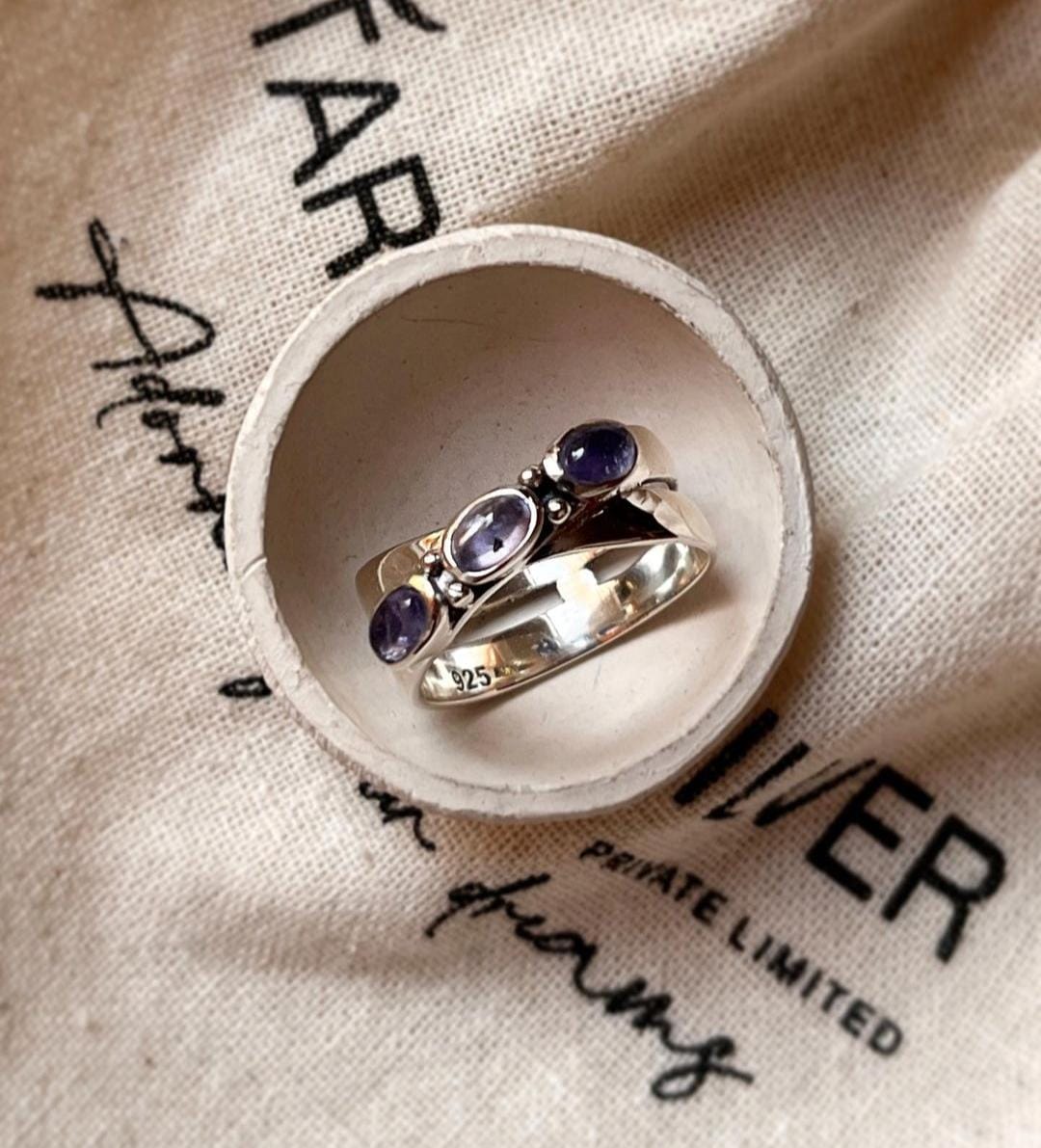 Unique tanzanite cross silver band ring