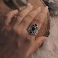 Sophisticated Vintage Filigree Silver Ring Featuring Black Onyx