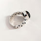 Exquisite black onyx Cuban link silver ring with a contemporary twist.