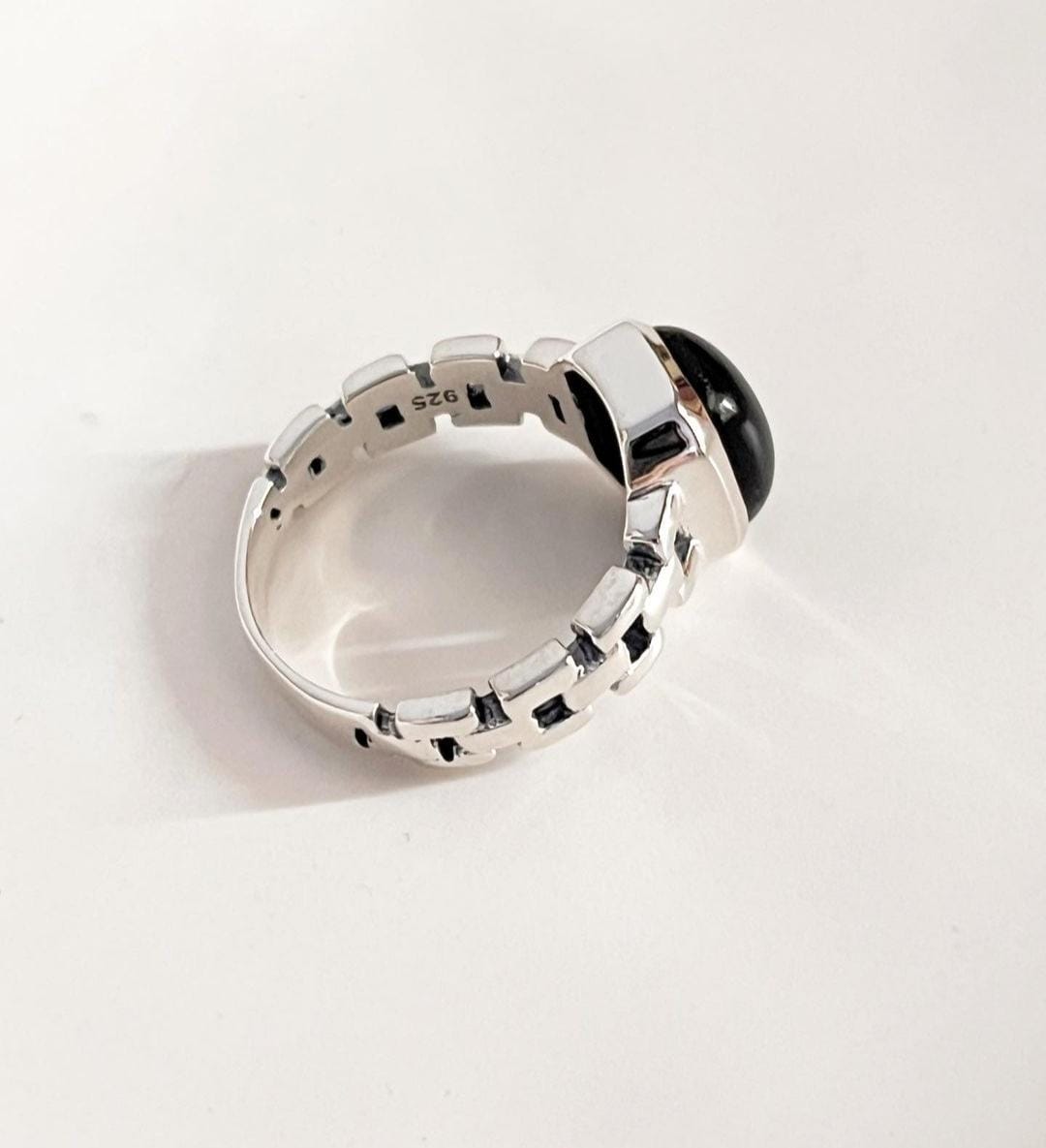 Exquisite black onyx Cuban link silver ring with a contemporary twist.