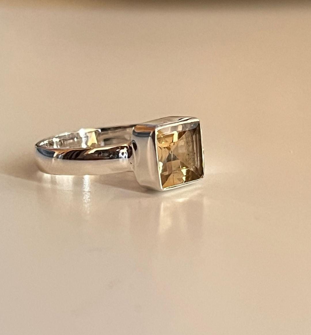 Square cut citrine gemstone in a fine silver ring
