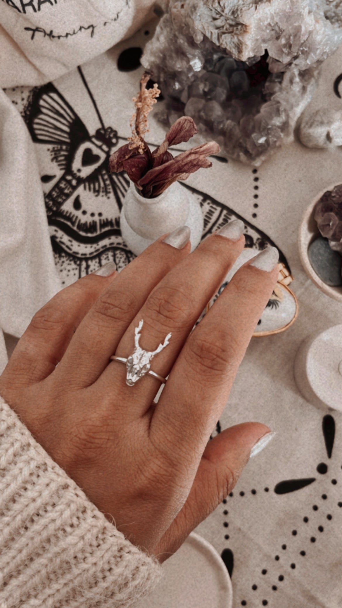 Intricate deer skull ring in sterling silver with smooth finish