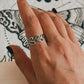 Elegant silver ring with vines and leaf design