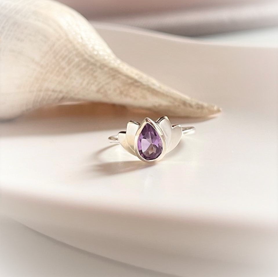 Silver Ring with Lotus Motif and Amethyst Gemstone