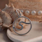 Wave round sterling silver pendant