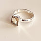 Stylish silver ring featuring a square cut citrine stone
