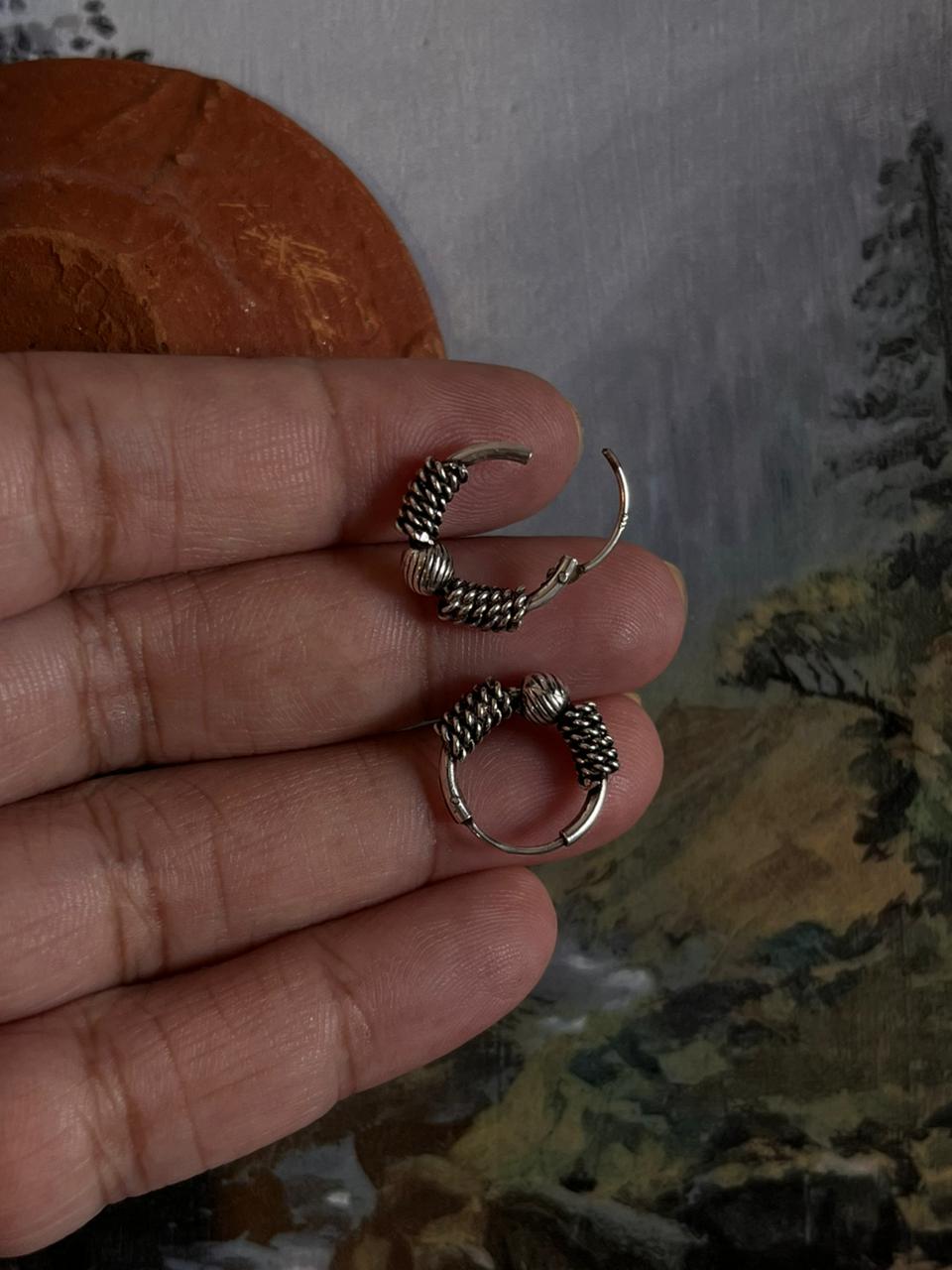 Classic design 1 antique silver hoop earrings for a sophisticated look.