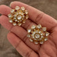 925 Sterling Silver Gold Plated Antique Moissanite Polki Earrings held in hand, showcasing floral design and sparkling stones.