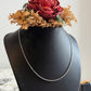 Timeless sterling silver chain featuring dot ball accents