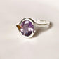 Elegant Silver Ring Featuring Oval Faceted Amethyst and Cross Motif