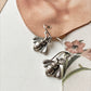 Elegant 925 sterling silver hook earrings with bee motif