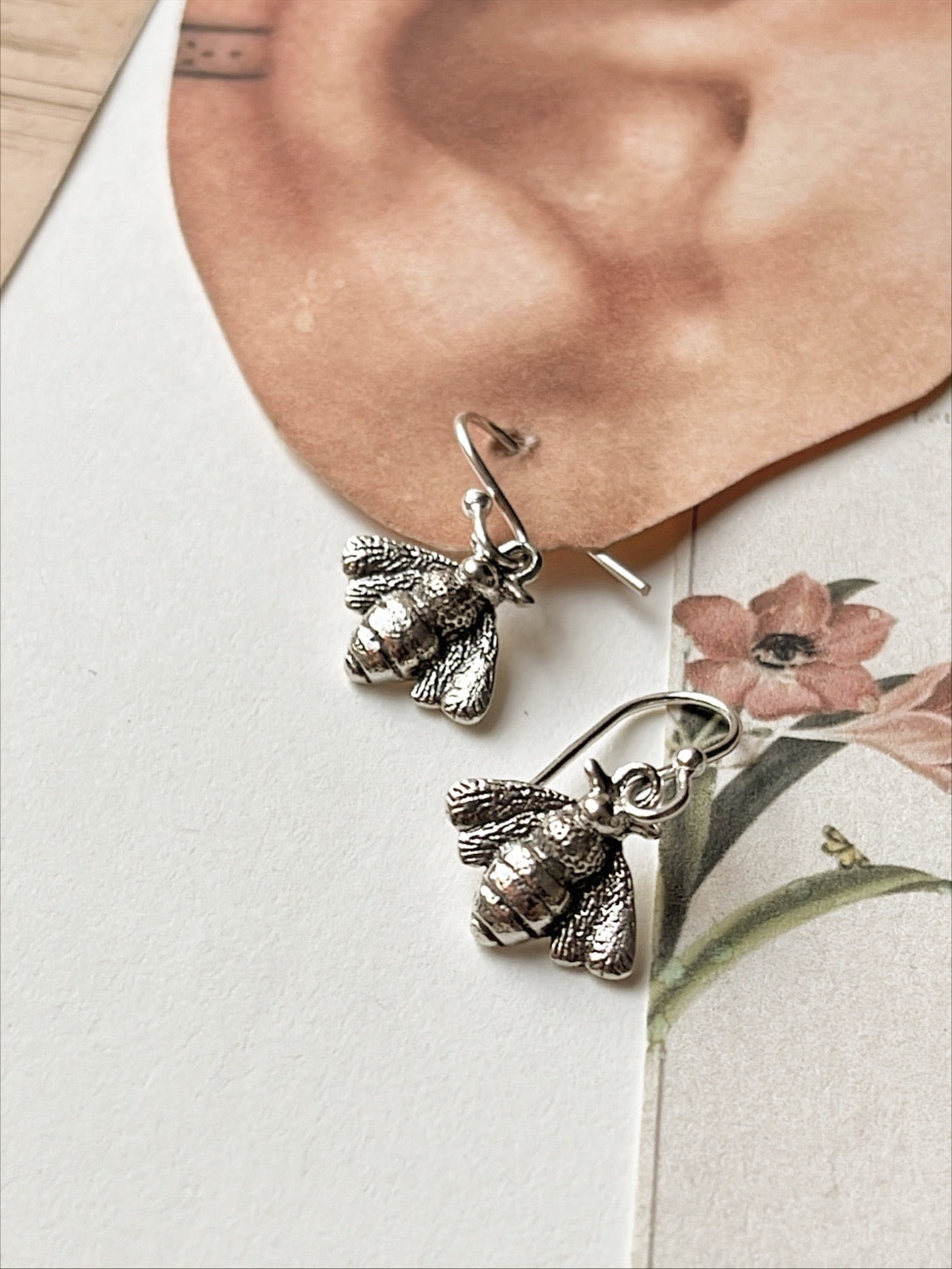Elegant 925 sterling silver hook earrings with bee motif