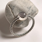 Beautiful rose quartz silver ring with rope band for a stylish look