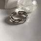 Timeless unisex silver band ring featuring double design elements