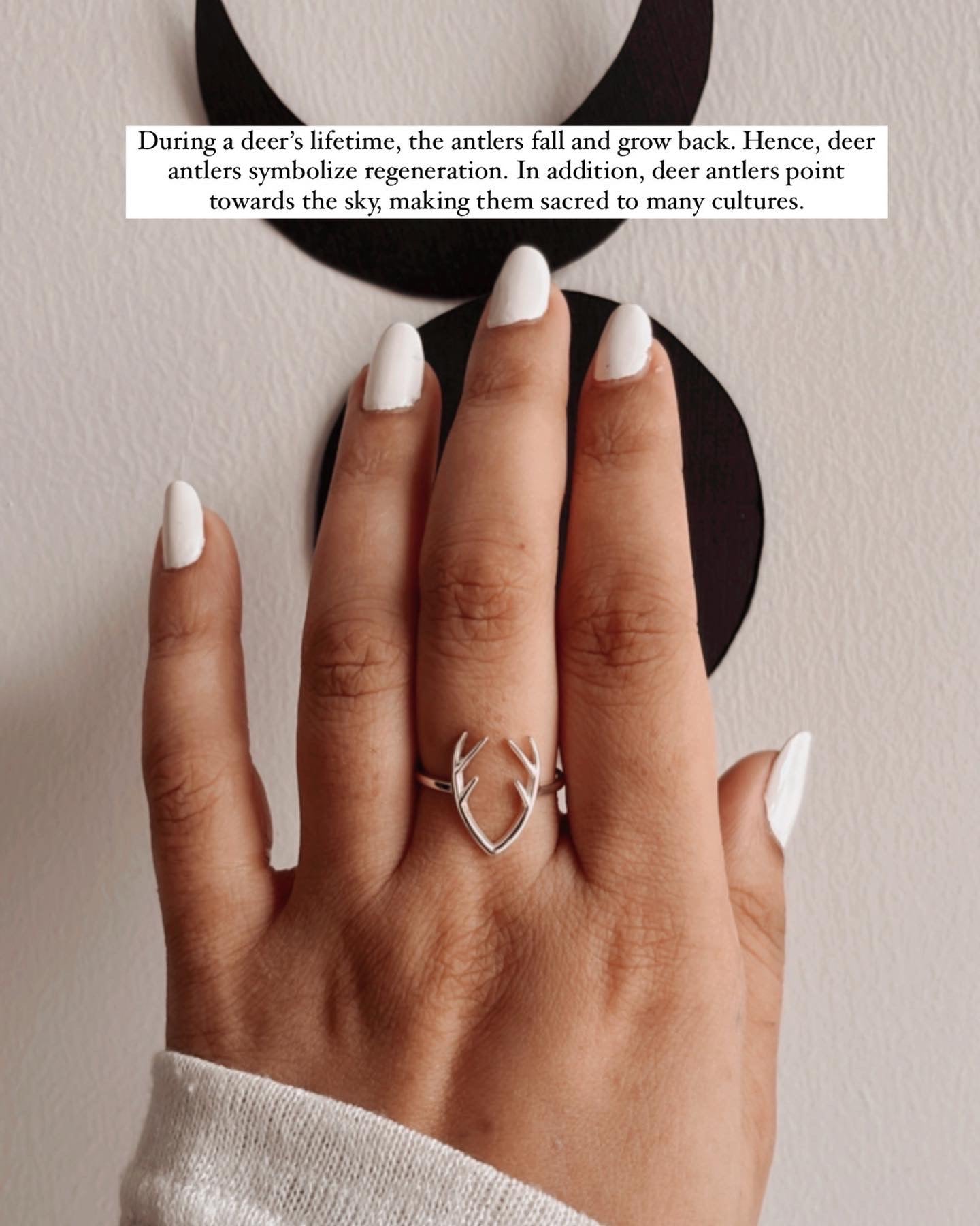 Handcrafted silver ring with a unique antler design.