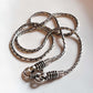 Antique patterned S-lock silver chain with intricate detailing.