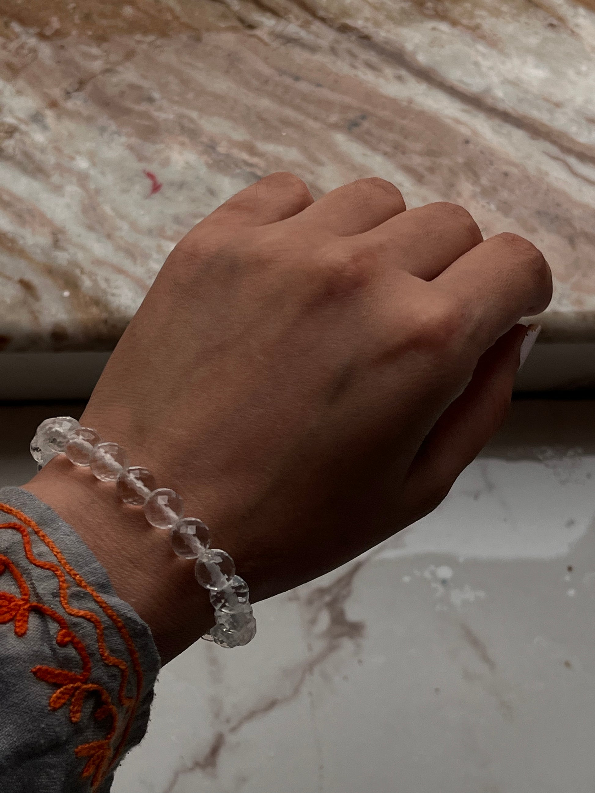 Faceted 8mm clear quartz crystal bracelet for energy cleansing
