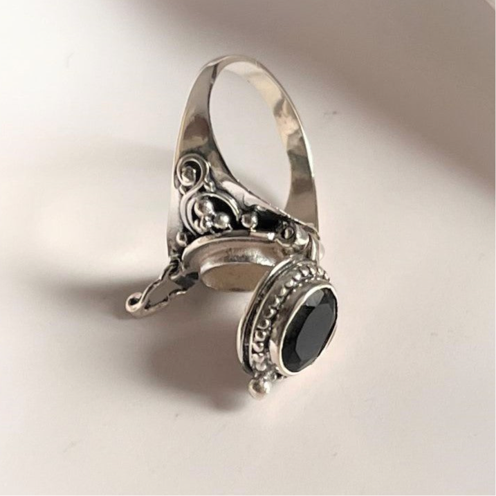 Classic Black Onyx Storage Ring with Vintage Silver Design