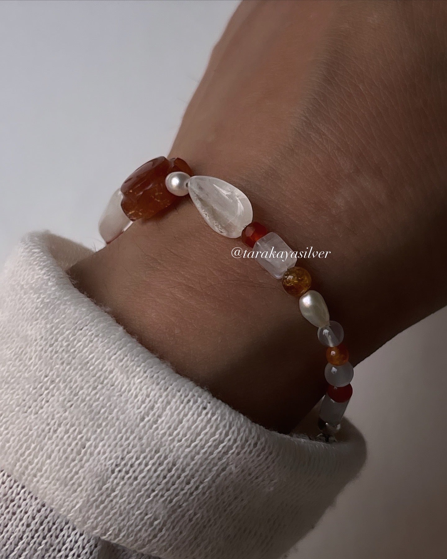 Sun-inspired handcrafted silver bracelet with sunstone gem