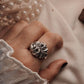 Handcrafted chunky ring featuring a timeless vintage motif
