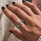 Nature-inspired vines and leaf silver ring