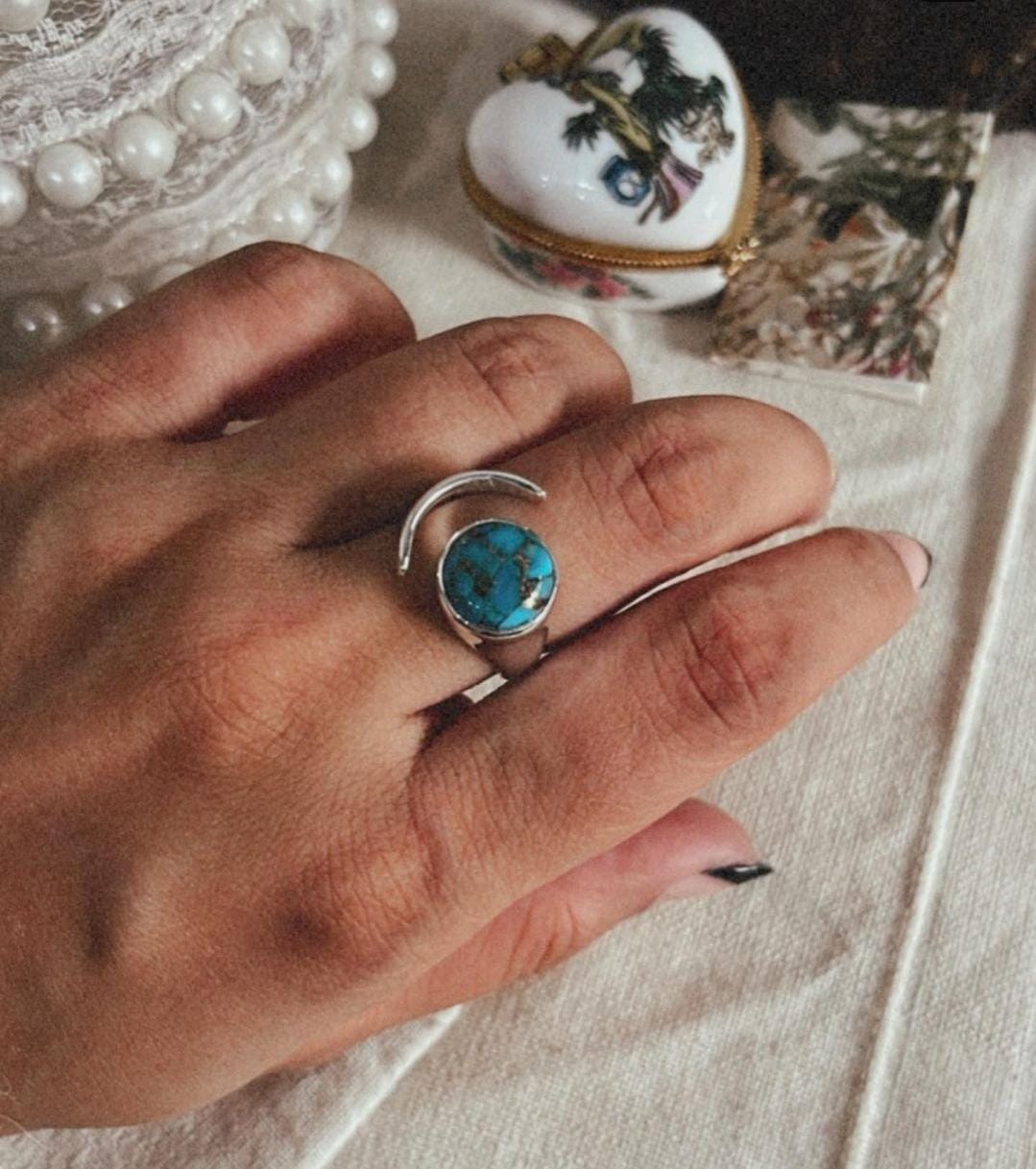 Chic adjustable silver ring with copper turquoise moon-shaped gemstone