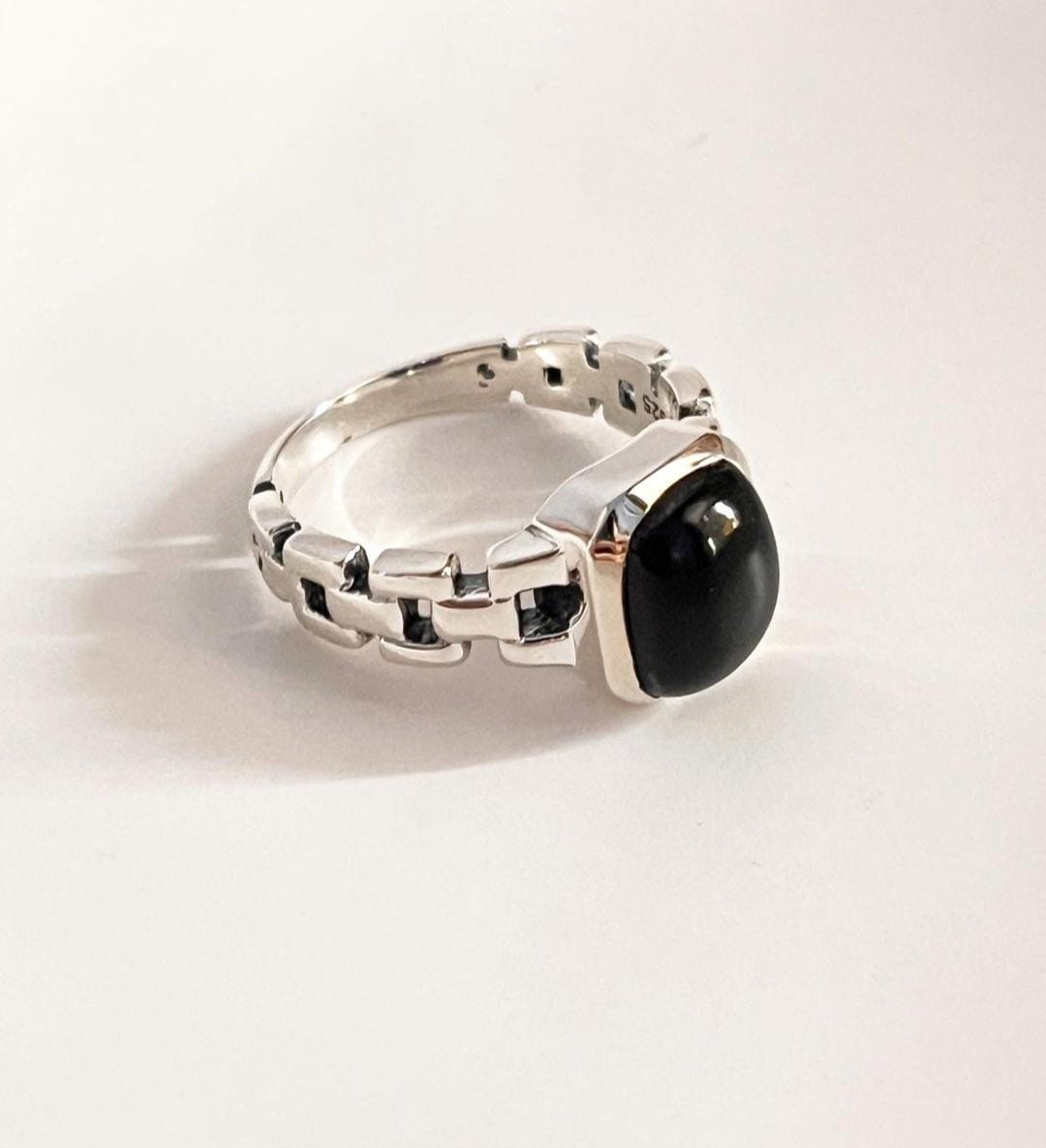 Chic black onyx Cuban link silver ring for a bold, masculine look.