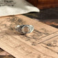 Handcrafted boho silver ring featuring a round clear quartz gemstone