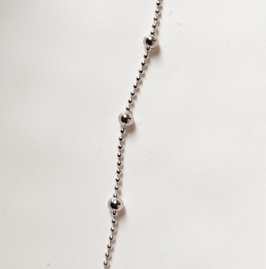 Sleek satellite silver chain with spaced dot elements