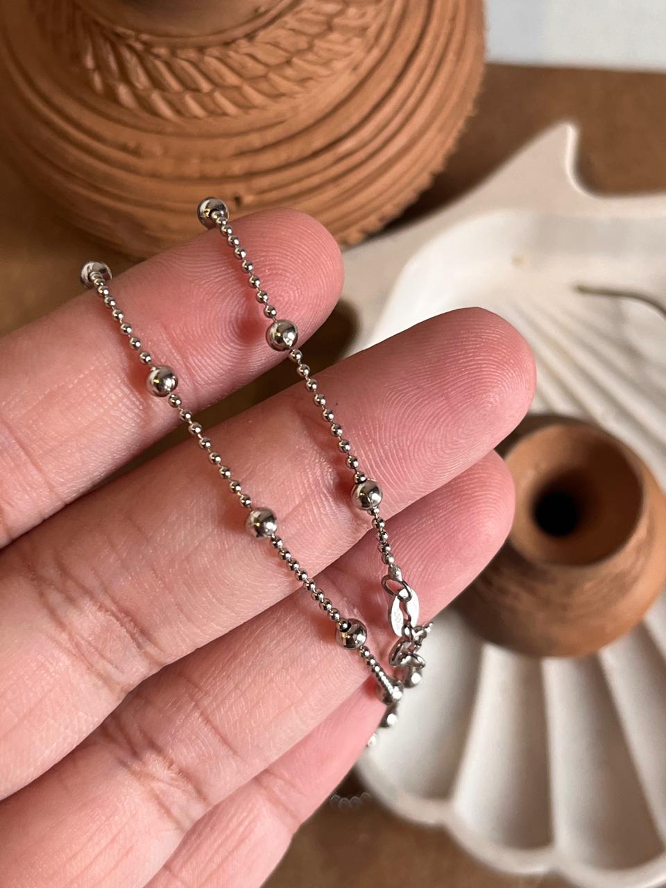 Sleek satellite silver chain with spaced dot elements