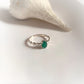 Sterling silver ring featuring a vibrant green onyx stone