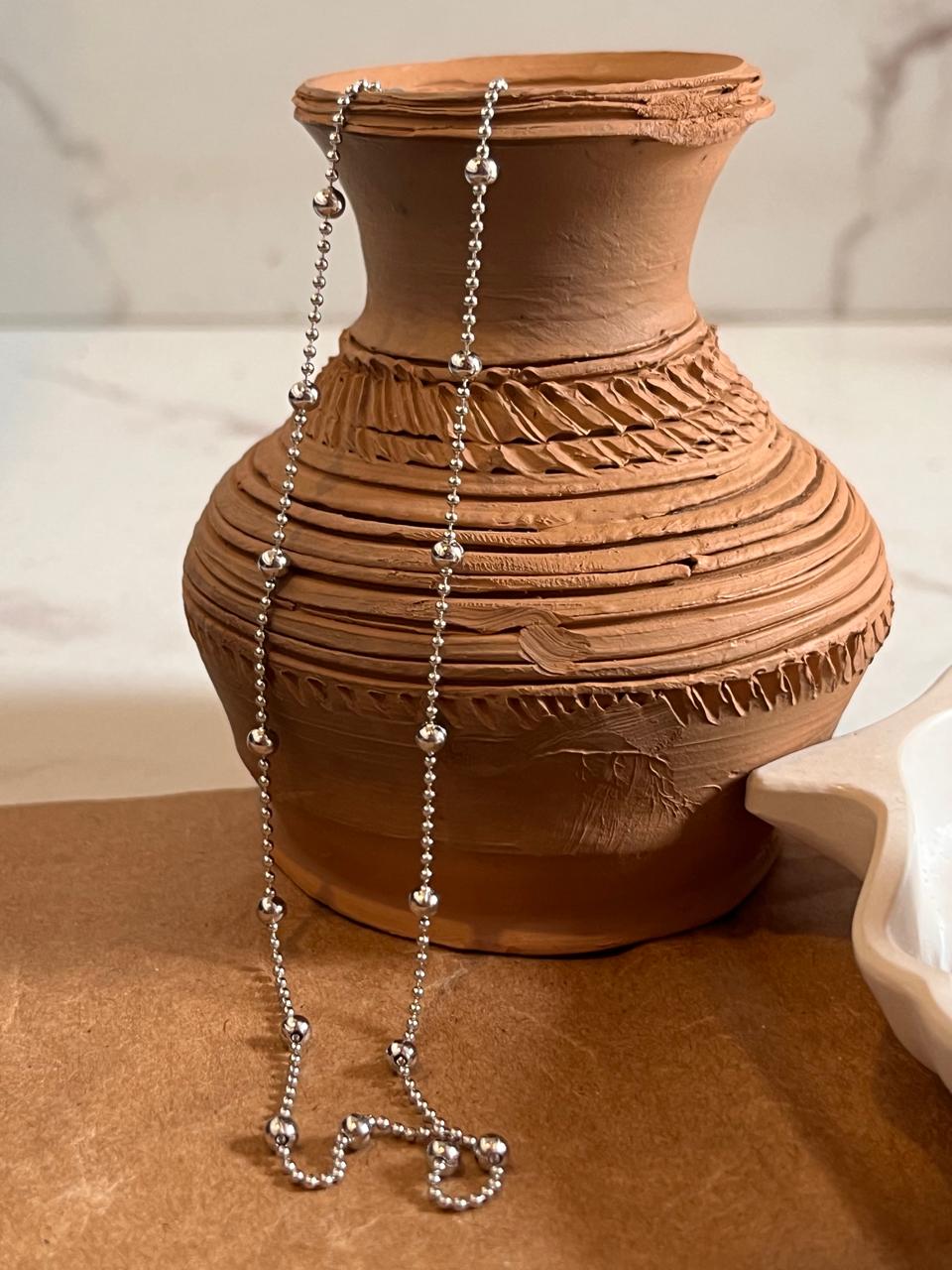 Elegant silver satellite chain featuring dot embellishments